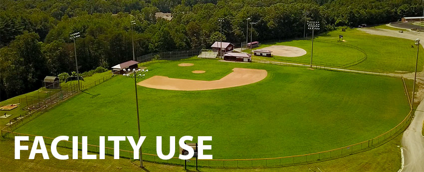 Facility Use banner with a drone shot of the baseball field