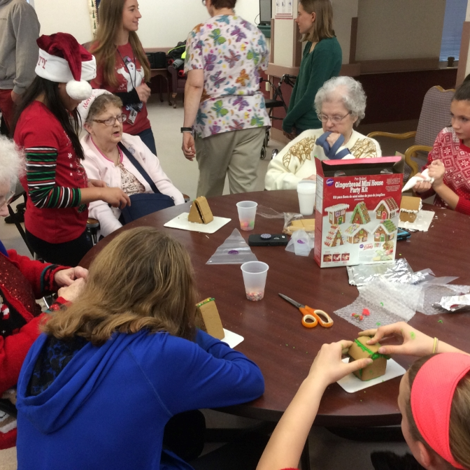 Students working with the elderly during during the holidays