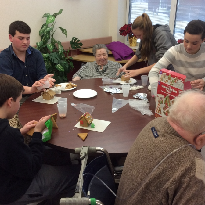 Students working with the elderly during during the holidays