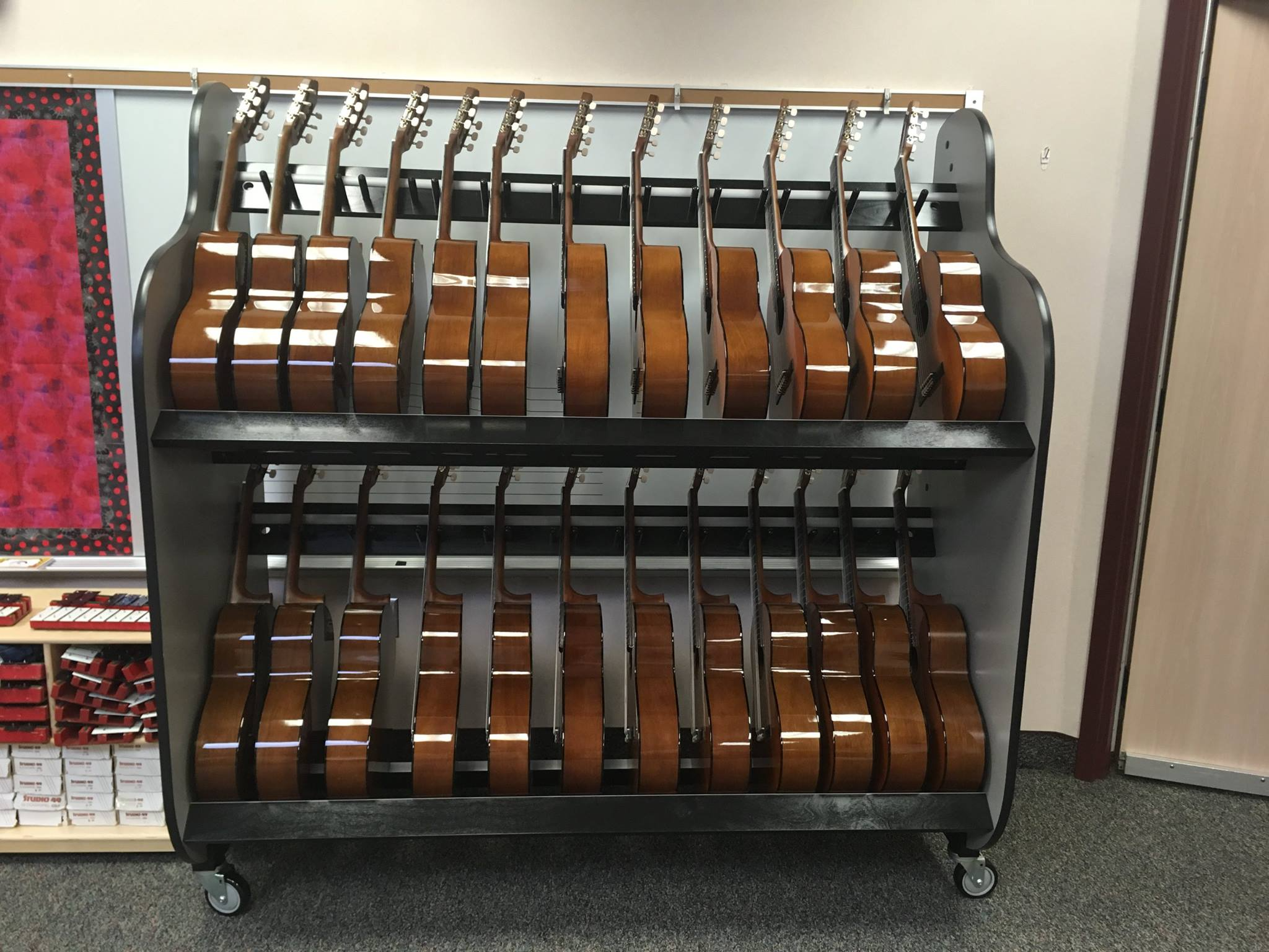 Guitars stacked in a holder