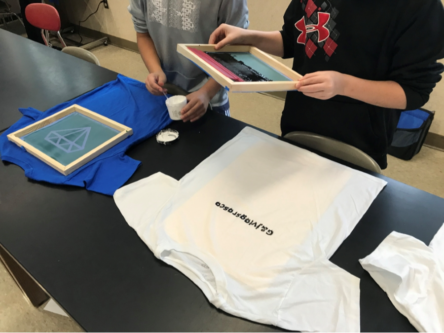 Middle school students using Screen Printing tools