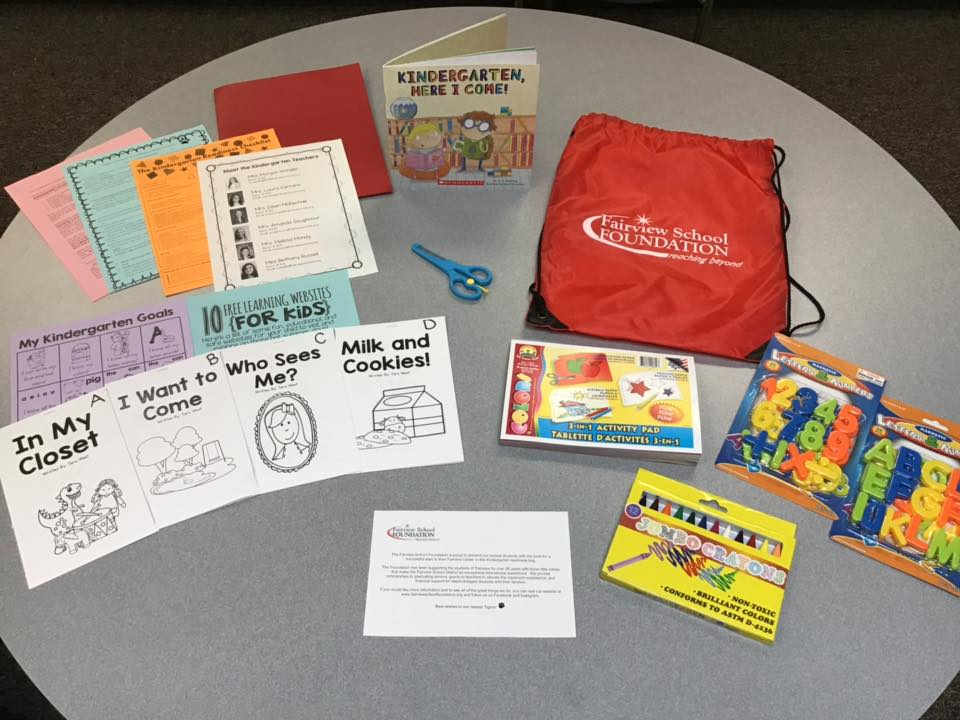 Elementary school ready kit with crayons, books, scissors