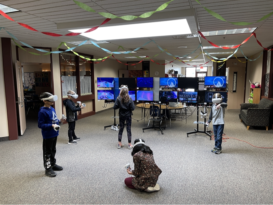 Elementary students using oculus quest headsets for VR/AR