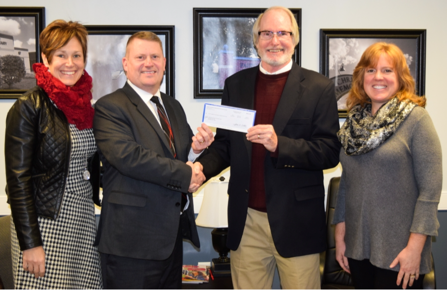 First National Bank EITC check presentation photo