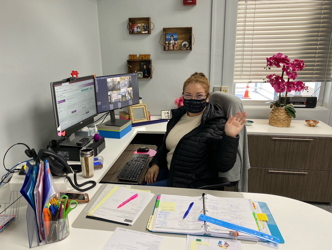 Member Alma Wright, Glen View Elementary Office Manager, working at her desk.