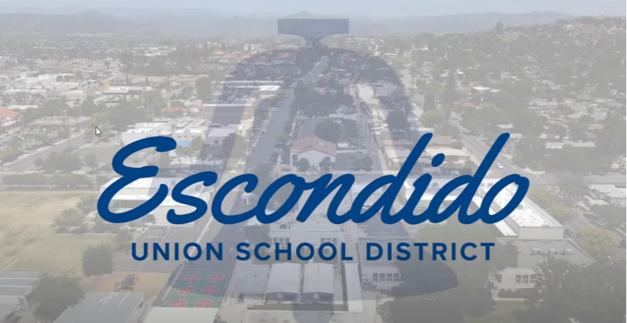 Escondido Union School District bell logo over an aerial view of Escondido.