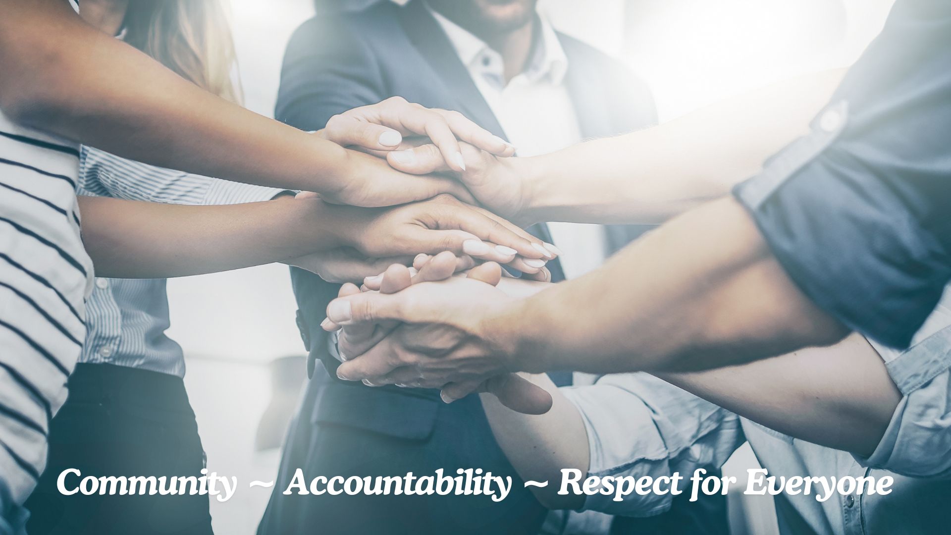 image of multiple people stacking their hands with text of community, accountability, respect for everyone