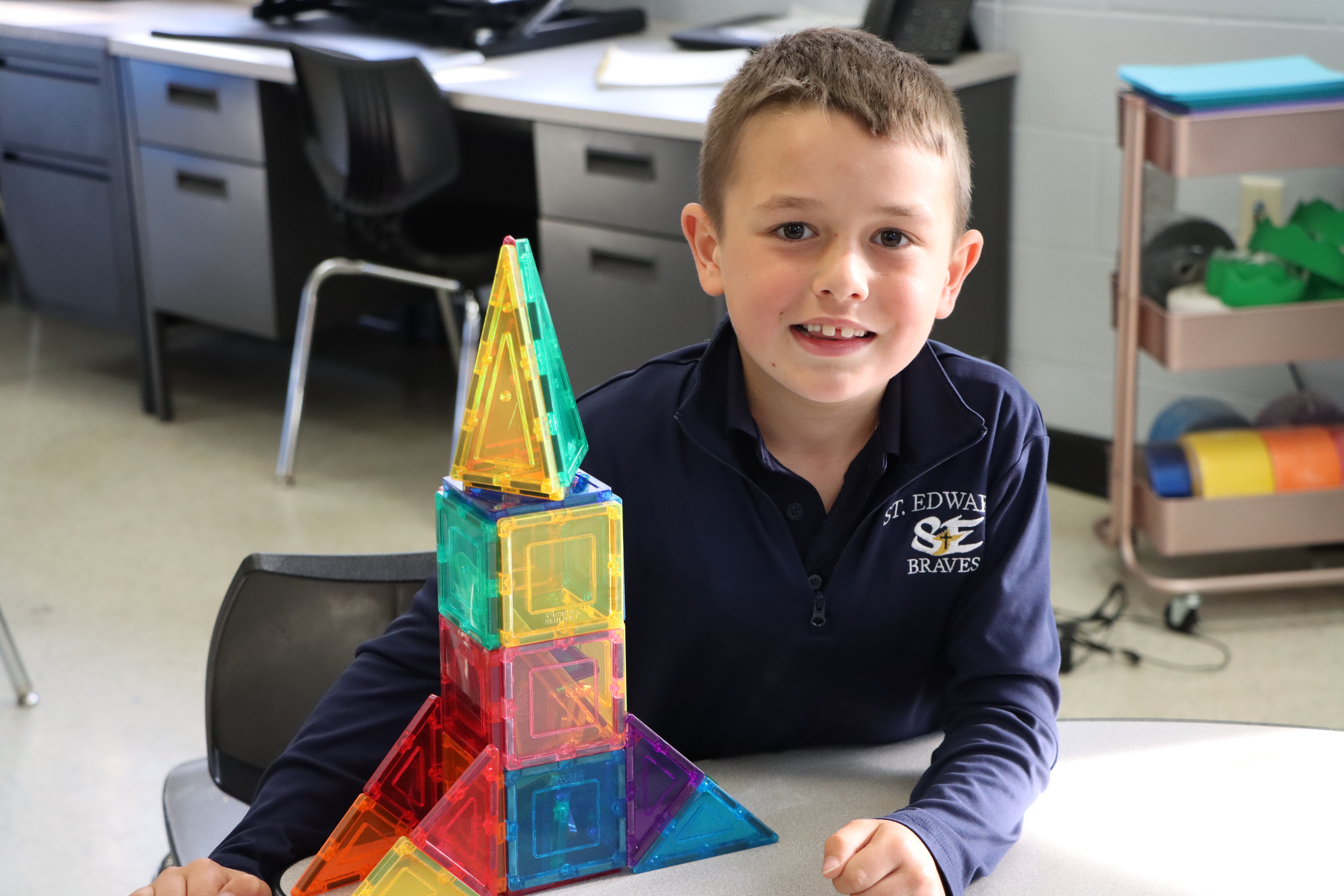 child with magnatiles
