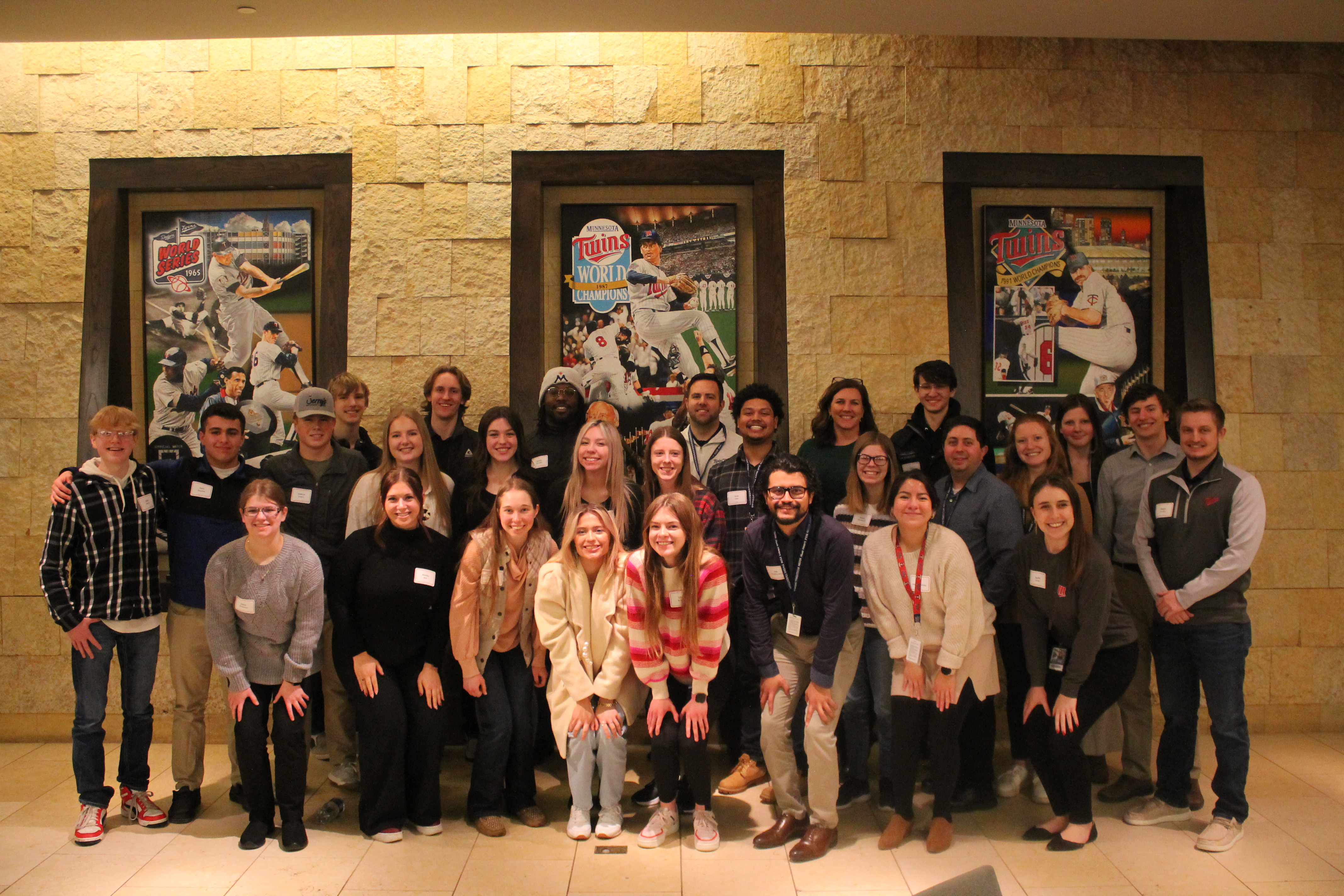 communications class students with their ementors at Target Field