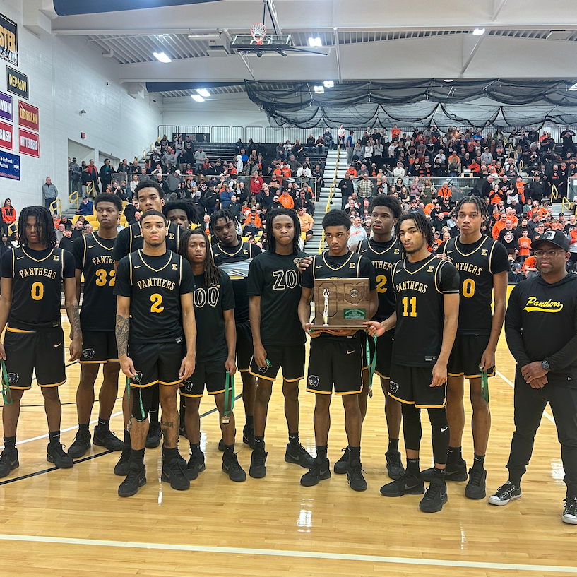 Euclid High School Boys Basketball Team holding the Regional Runner-Up Plaque