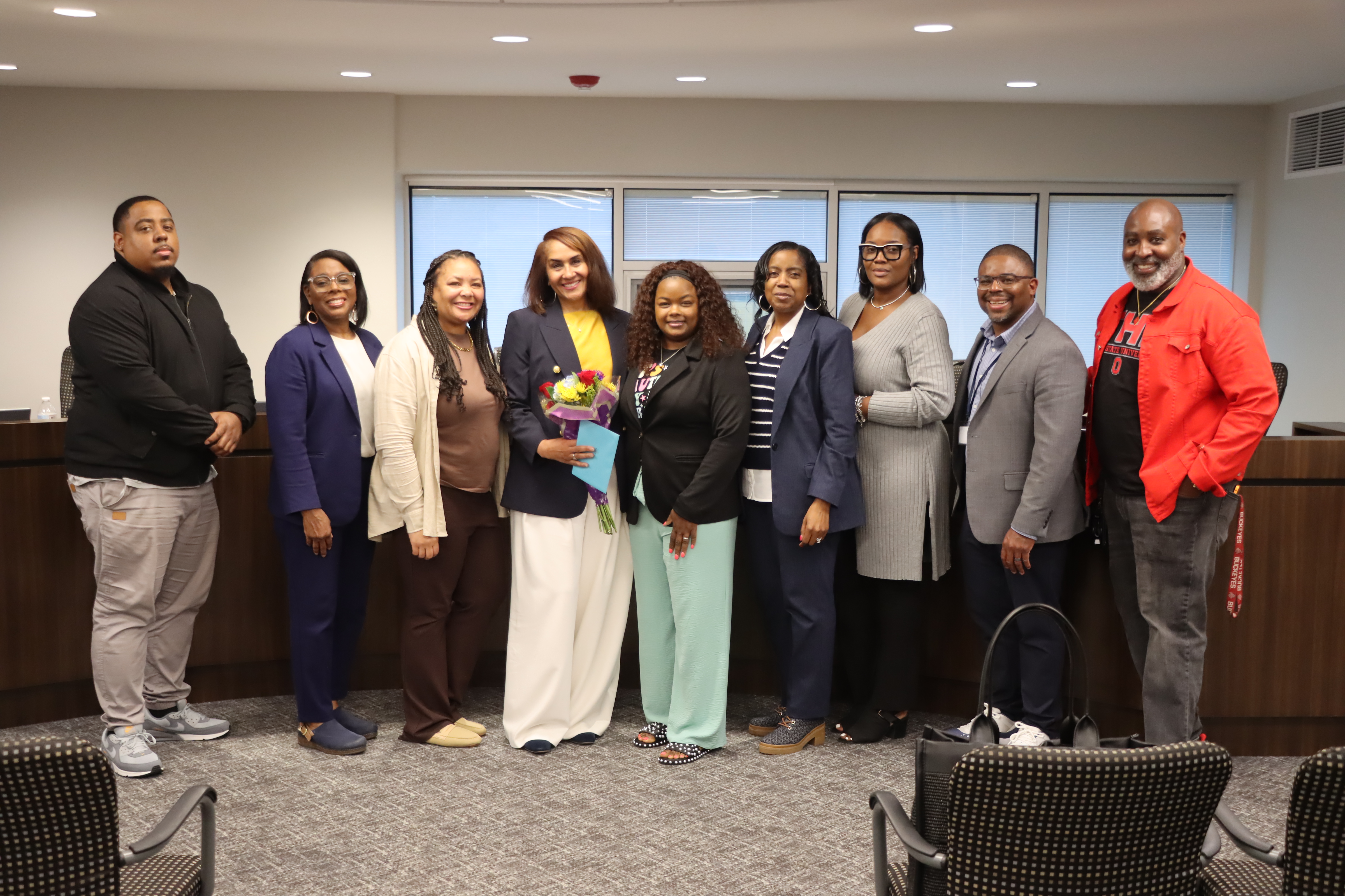 Karen Brown posing for a picture with Euclid Schools Principals and Assistant Principals.