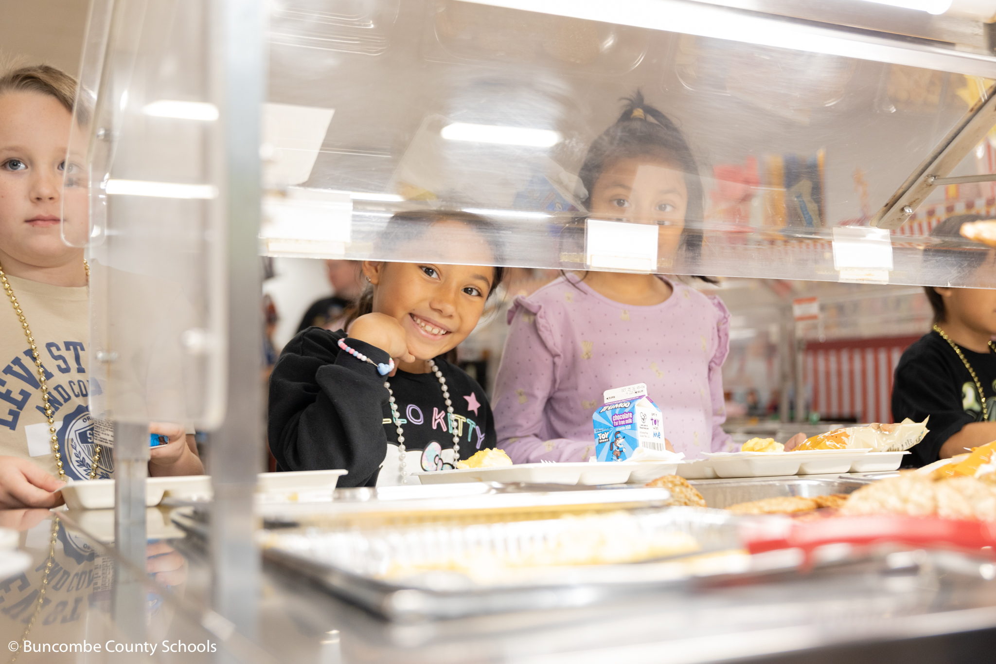 Student going through the lunch line to get food. 