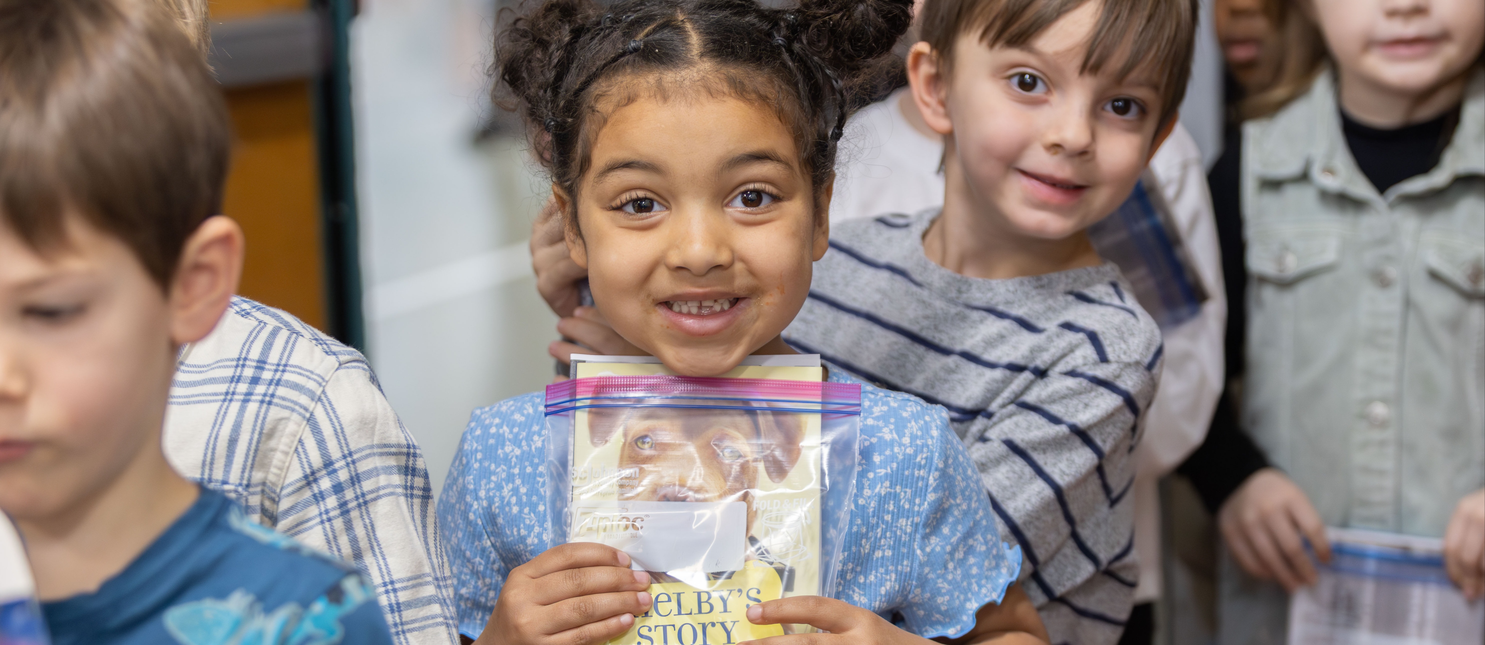 Student holding book