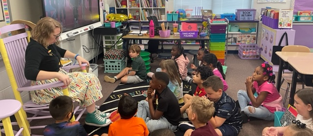 Ms. Myers reading to her 2nd  grade class