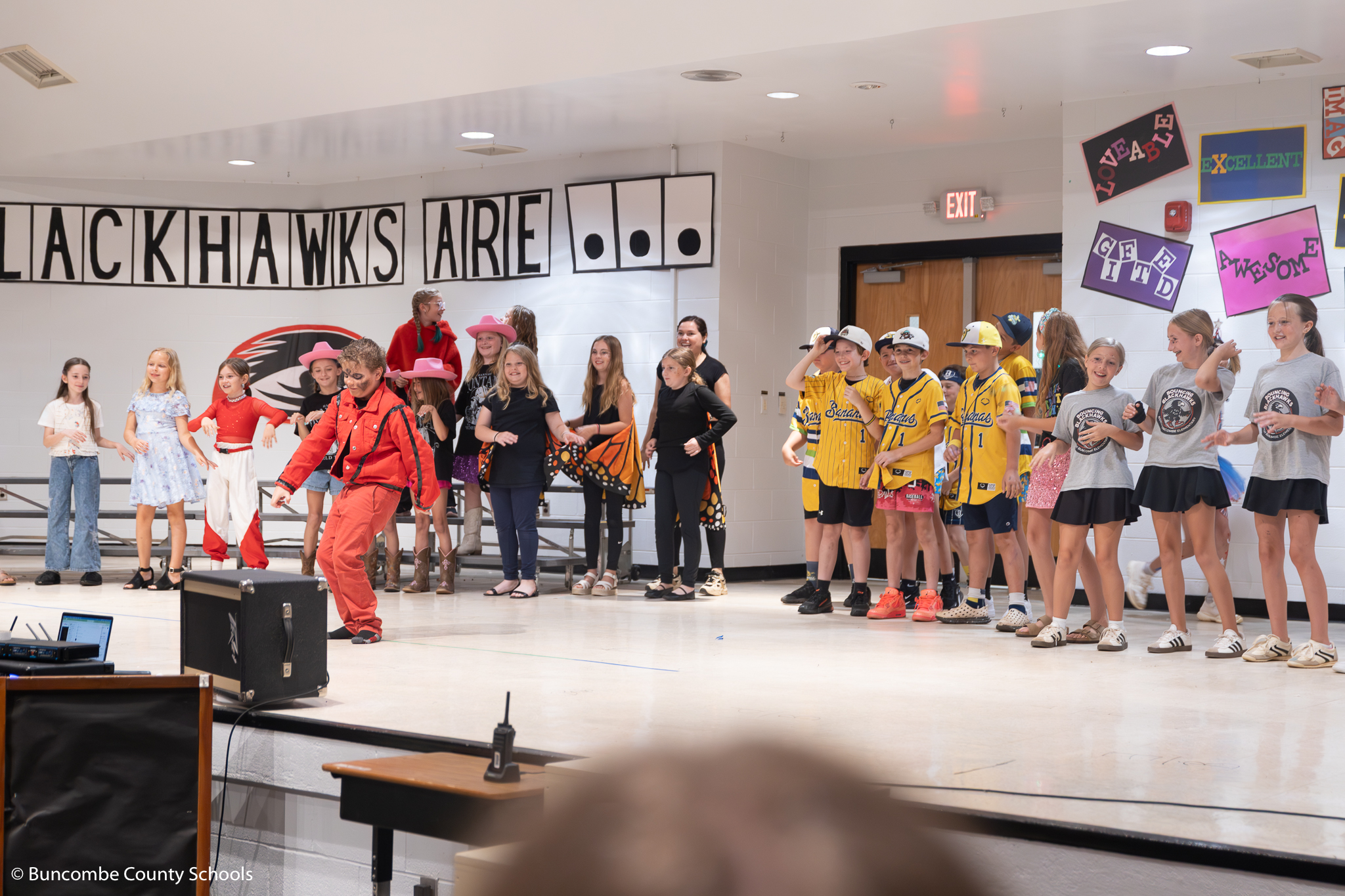 Fourth and third grade students performing at the end of year talent show. 