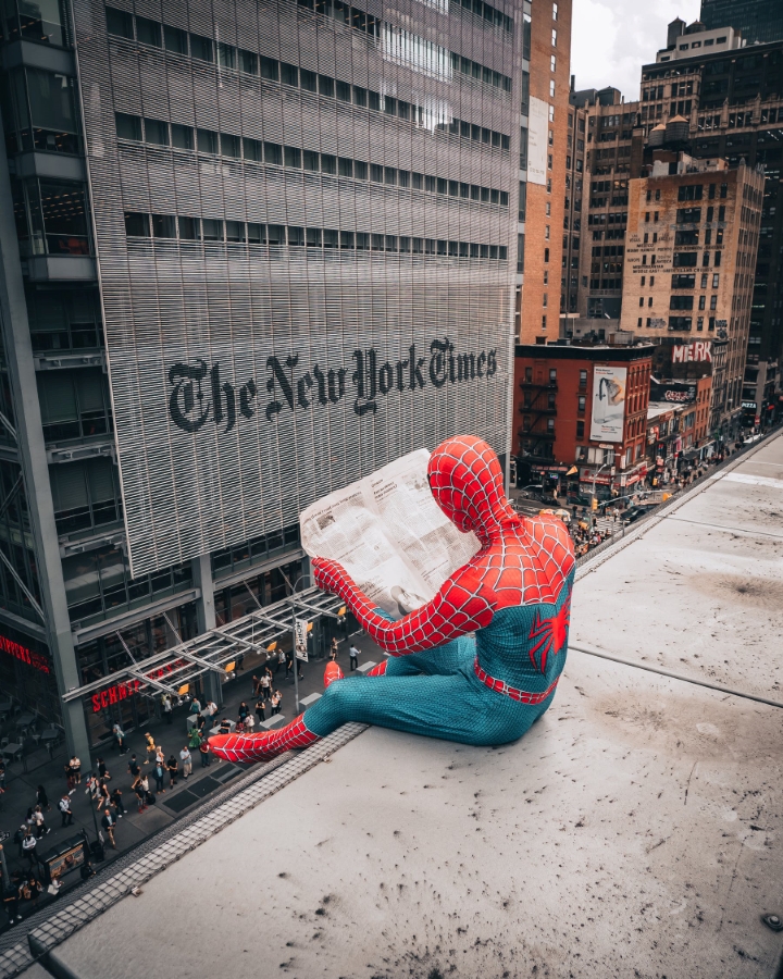 Spiderman reading the NY Times