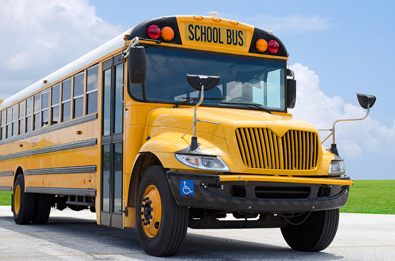 Photo of a yellow school bus.