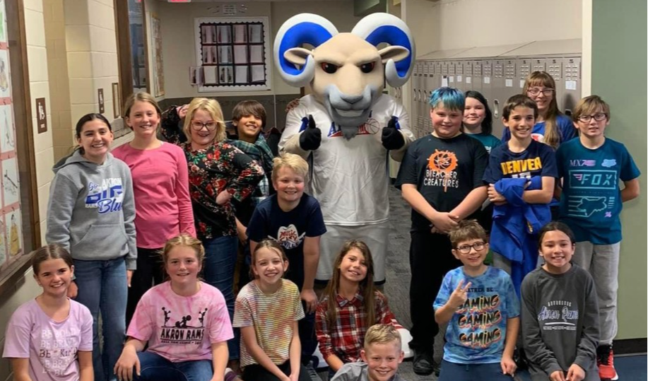 mascot with students