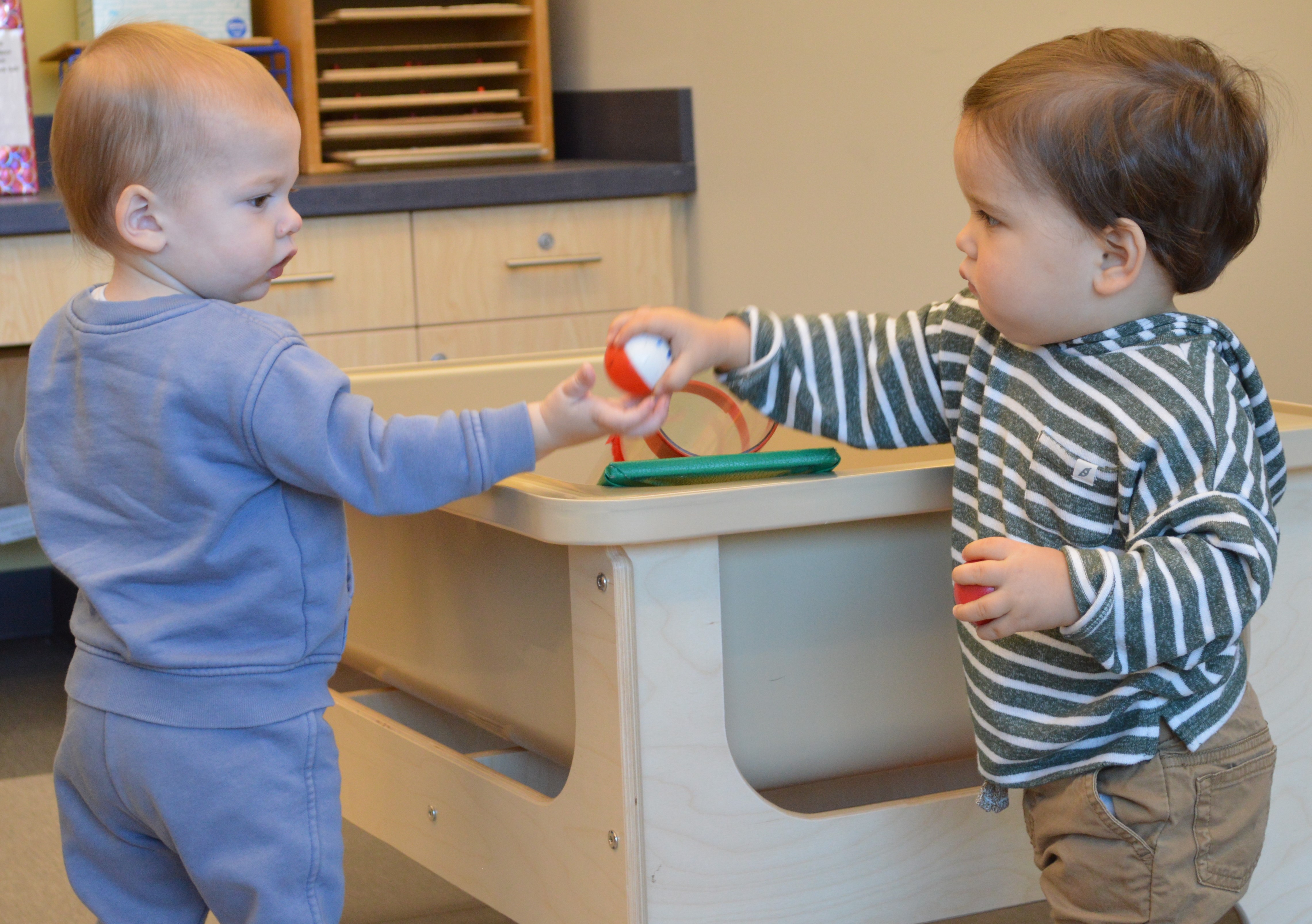 two boys playing with ball