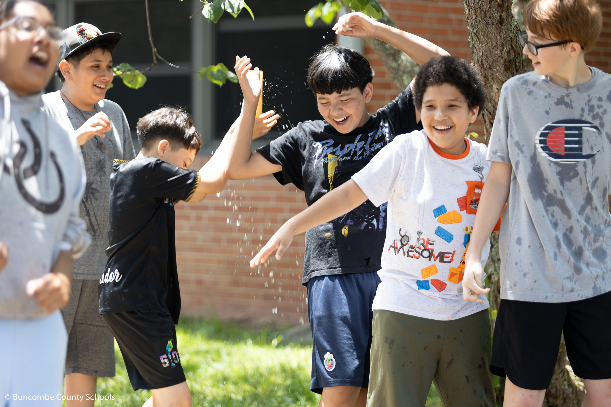 Students playing a water game at field day.