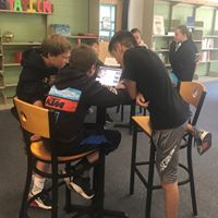 Group of kids in the library