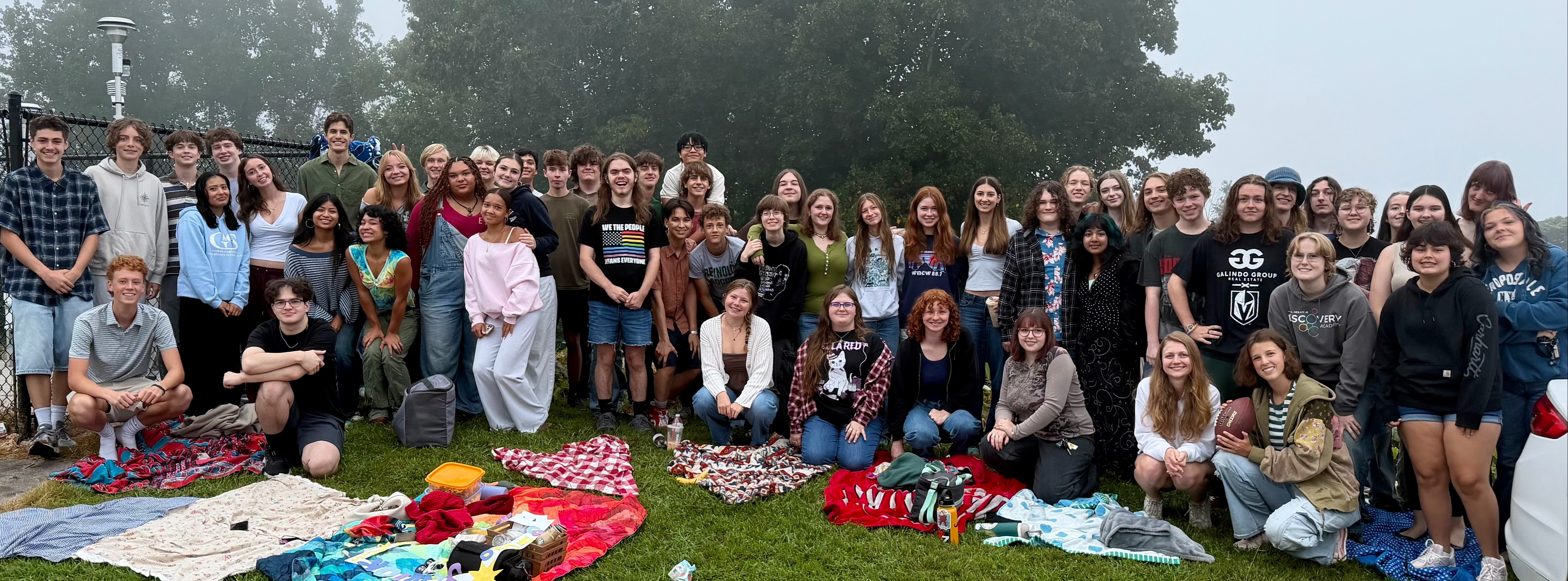 Group of senior students (Class of 2027) outside in front of the mountains for senior Sunset