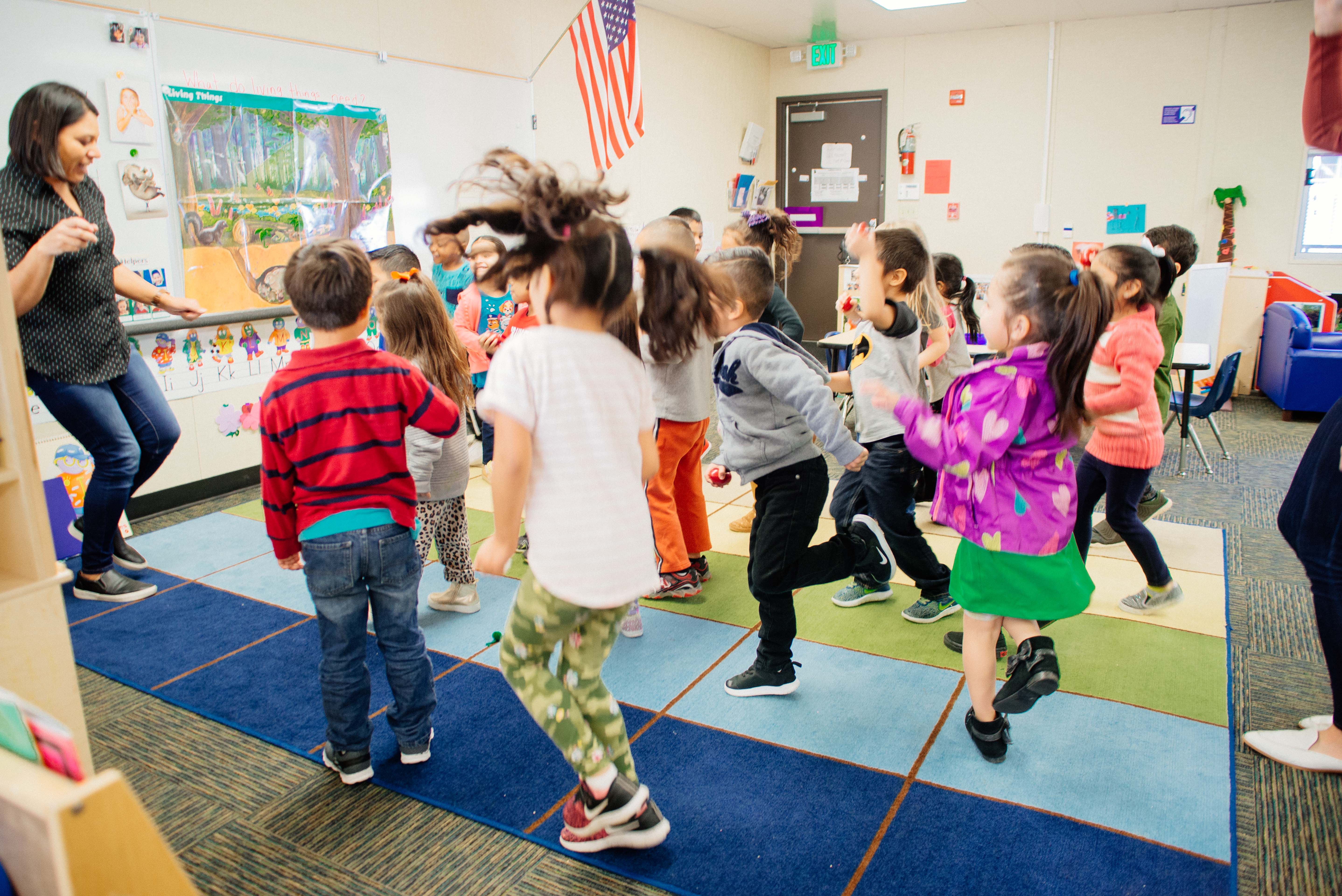 children dancing in preschool class
