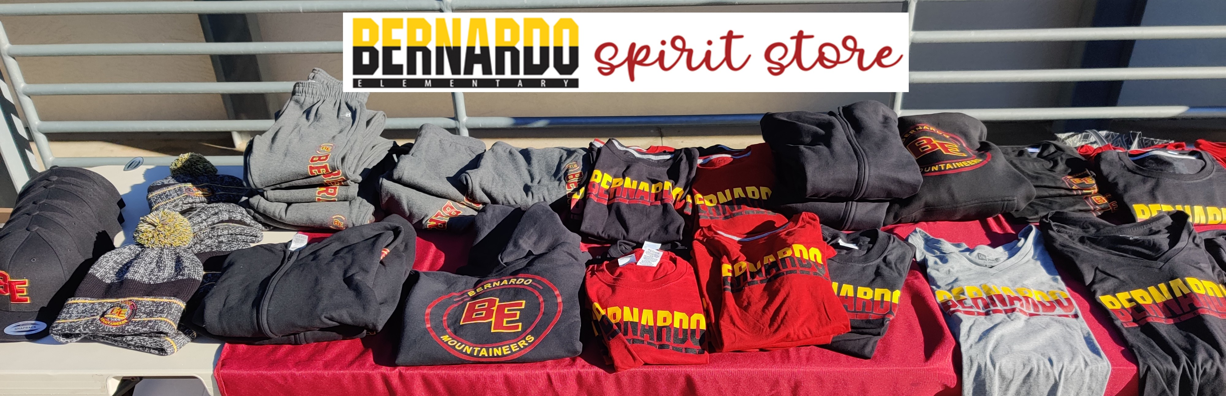Bernardo Spirit Wear Store showing table of spirit wear clothing.