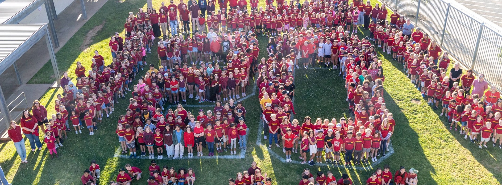 Aerial shot of students line up to form "20 YEARS" 