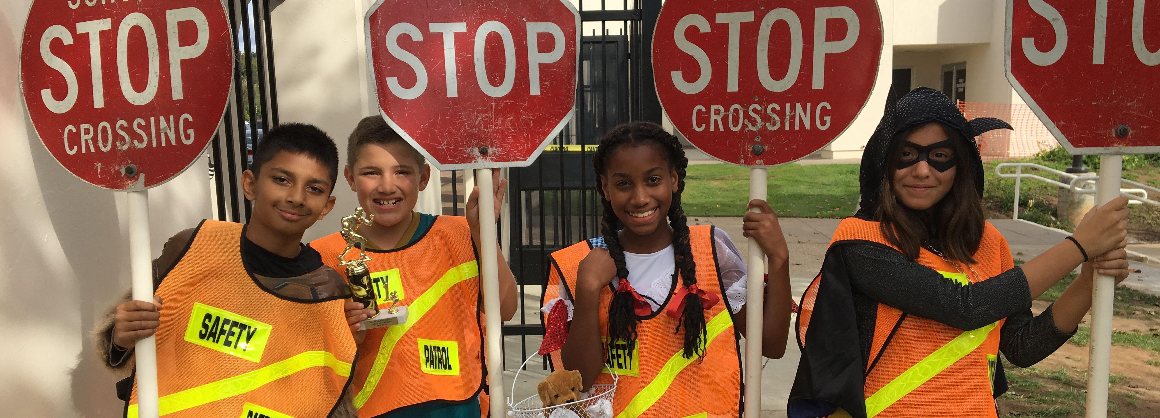 Kids holding stop signs