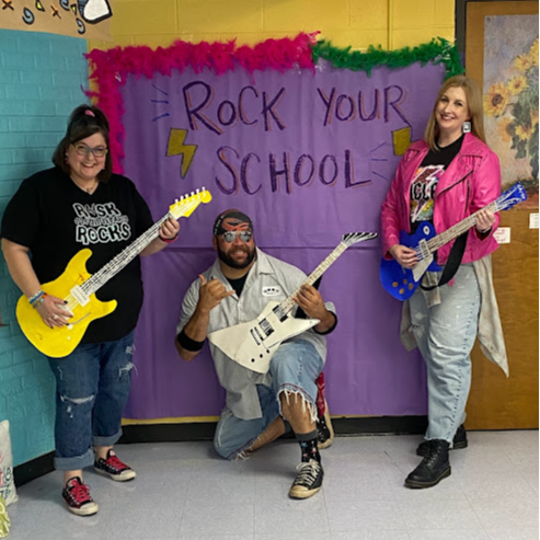 Rock Your School Teachers with guitars