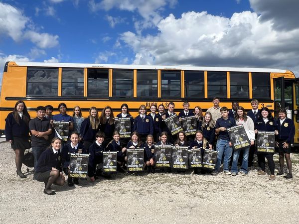 FFA students in front of school bus
