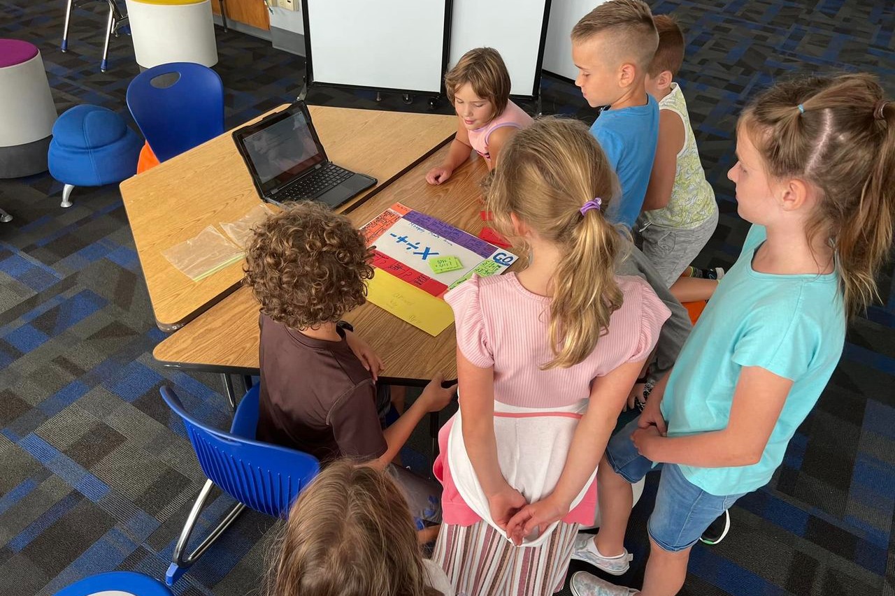 students looking at a computer