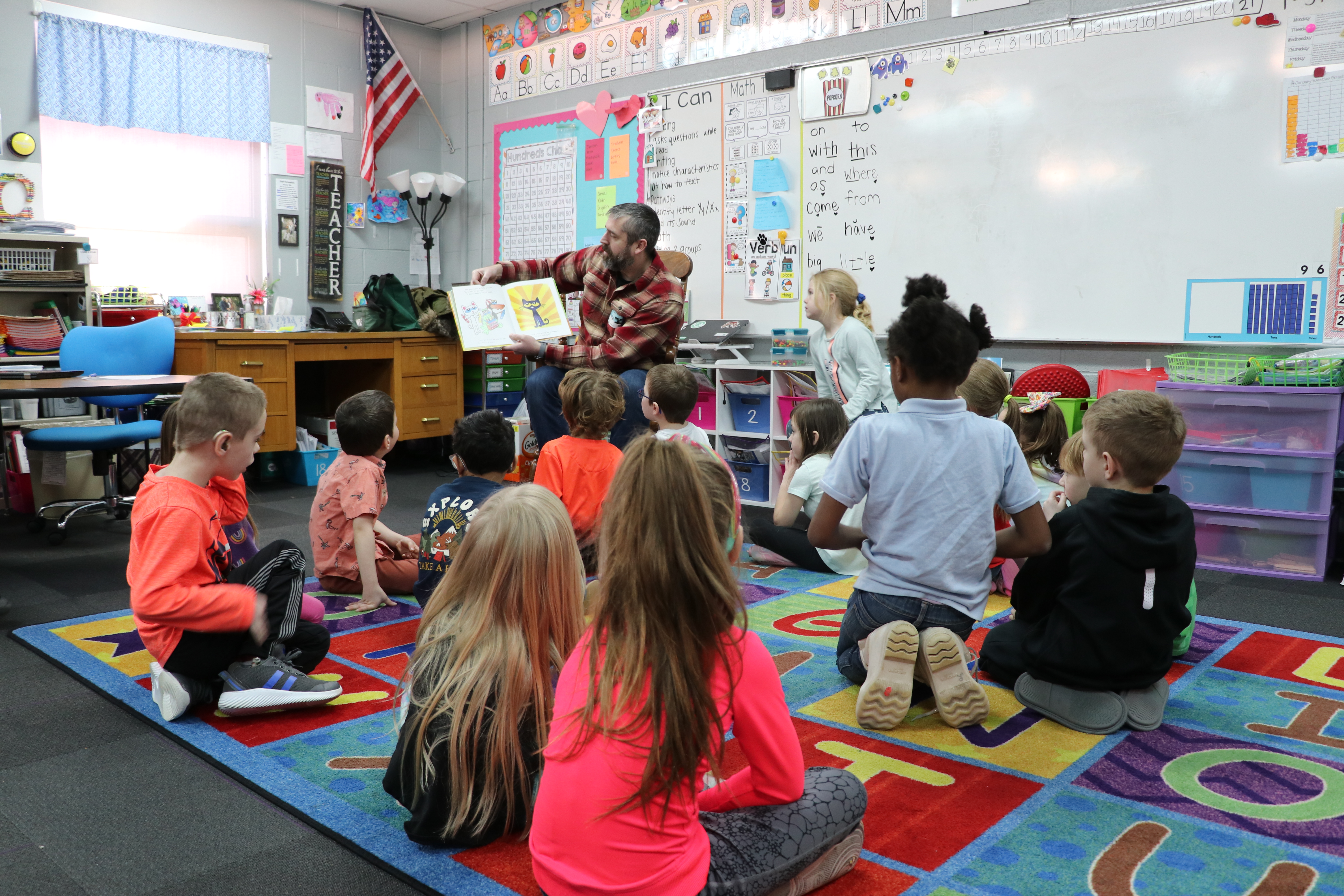 Dad of student reads to class at world read aloud day