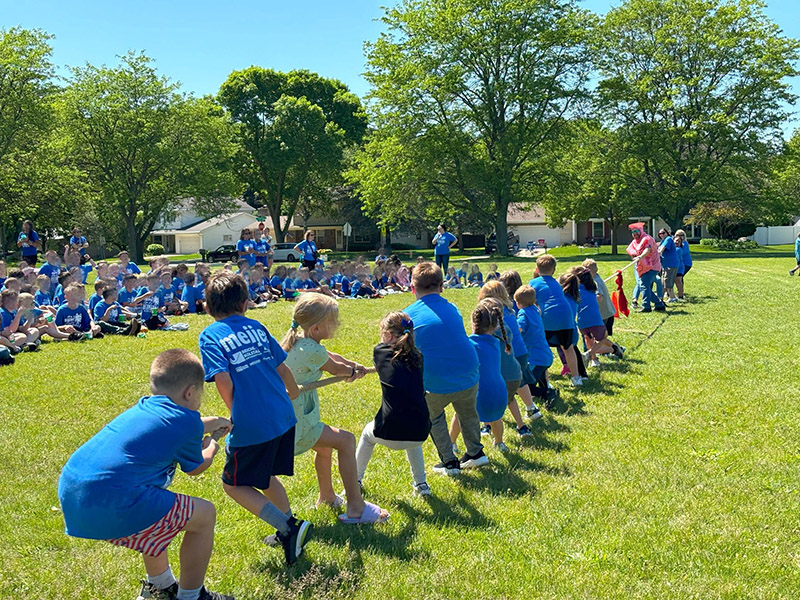 Students vs Teachers tug-of-war taking place after students return from the Walk