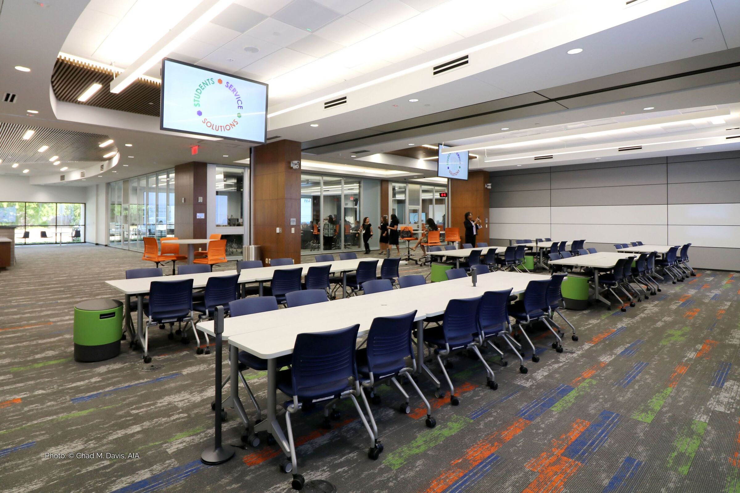 tables with tv and empty chairs