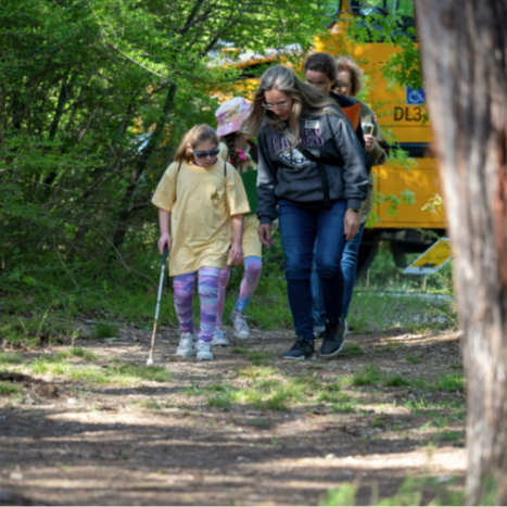 teacher and students at an excursion