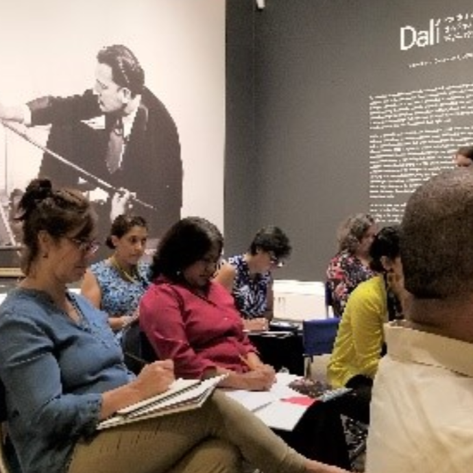 students taking notes at a classroom