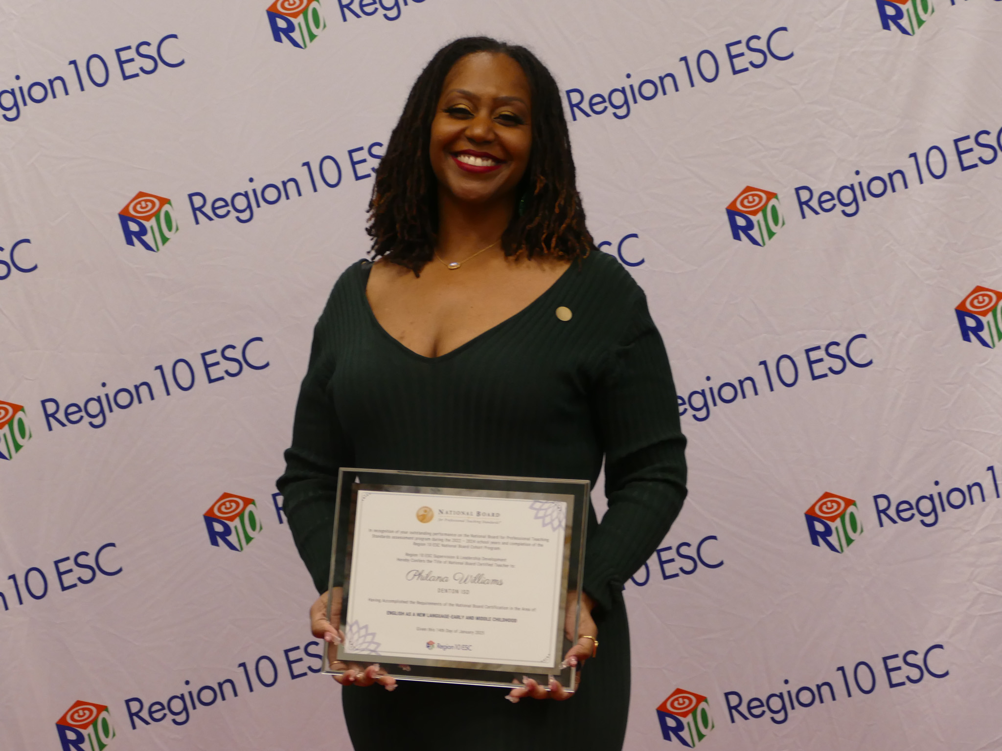 Teacher receiving her National Board certificate