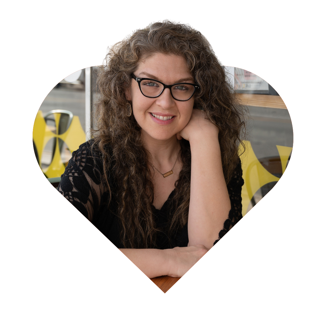 Headshot of Jenna Annas in a heart