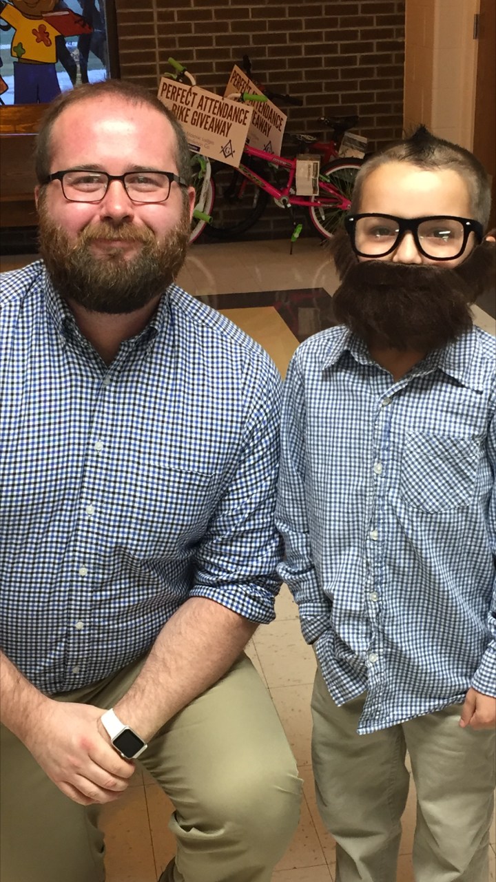 counselor and son in costume