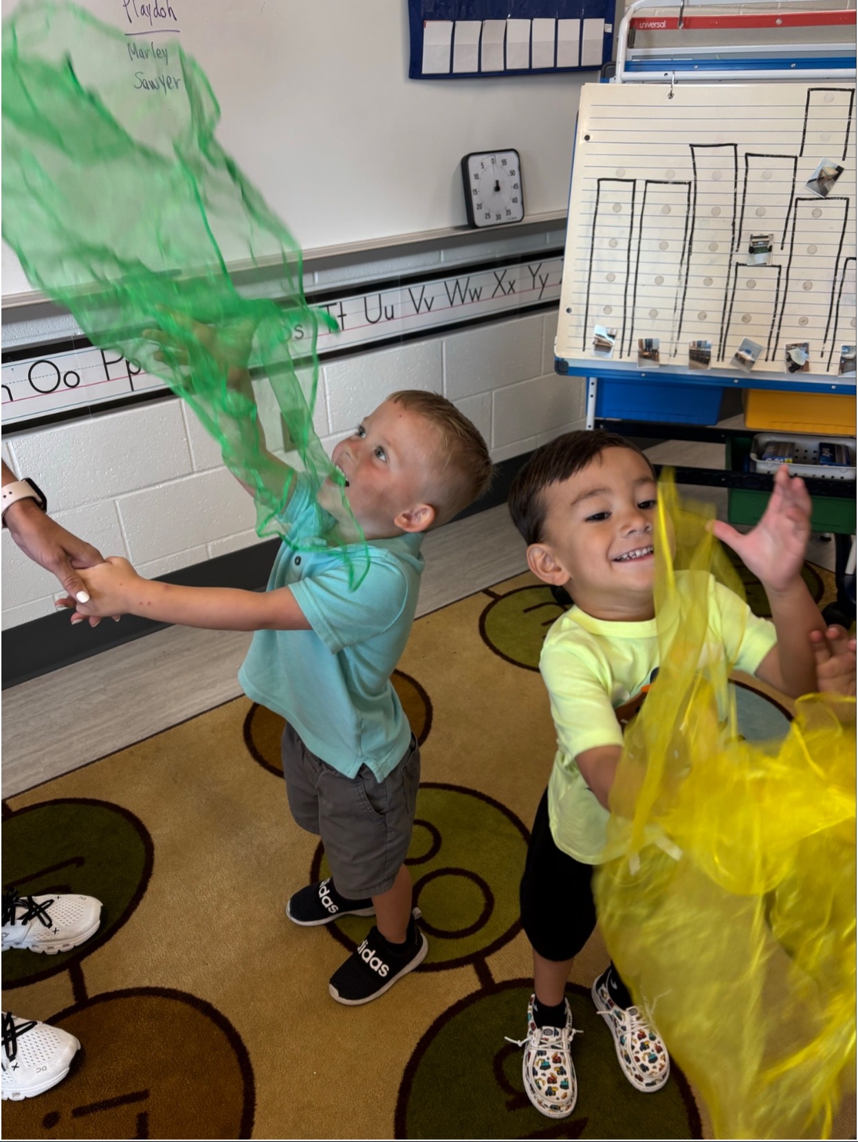 3 year kids tossing fabric