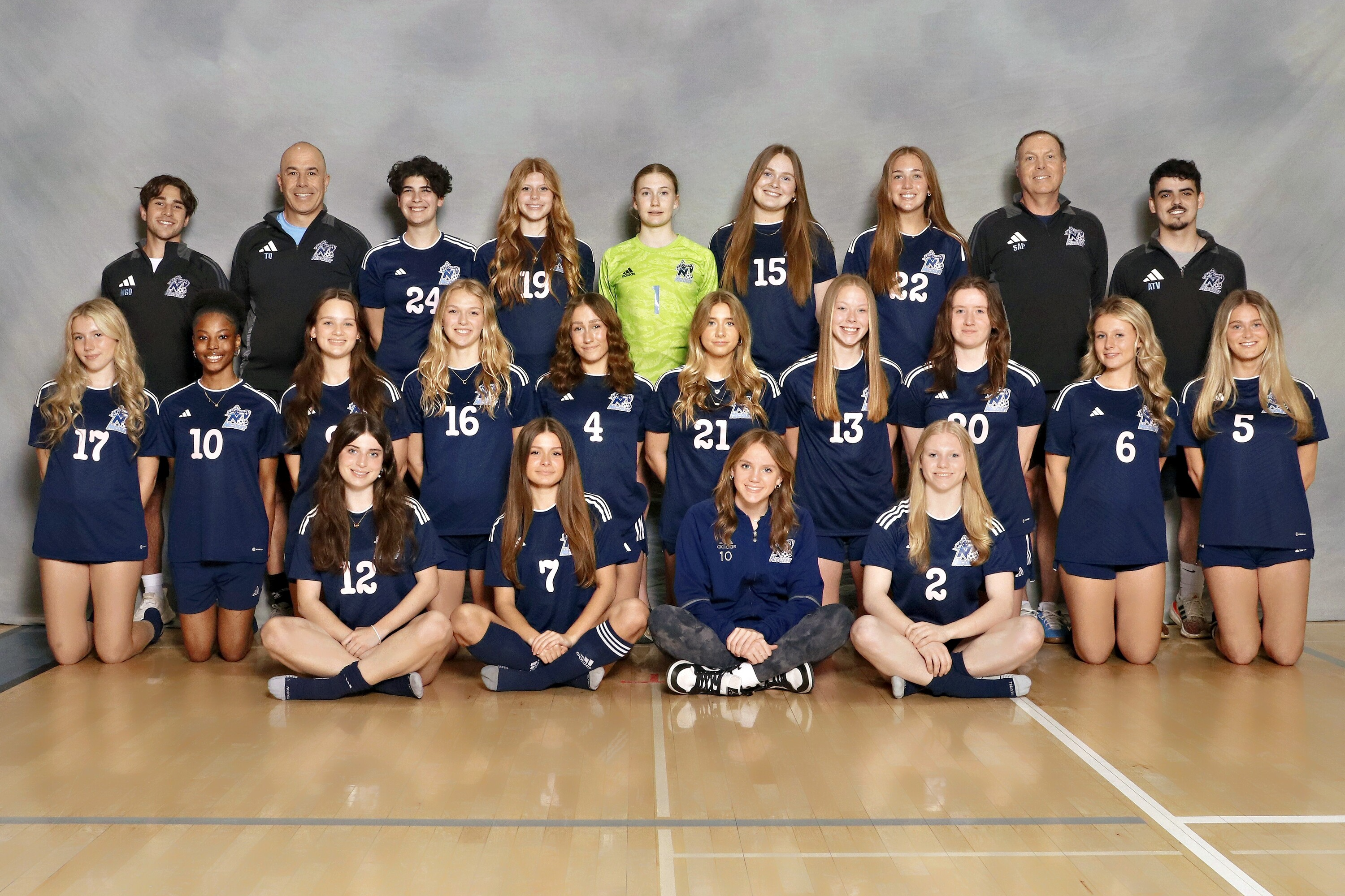team picture of the girls varsity soccer team posing for a picture