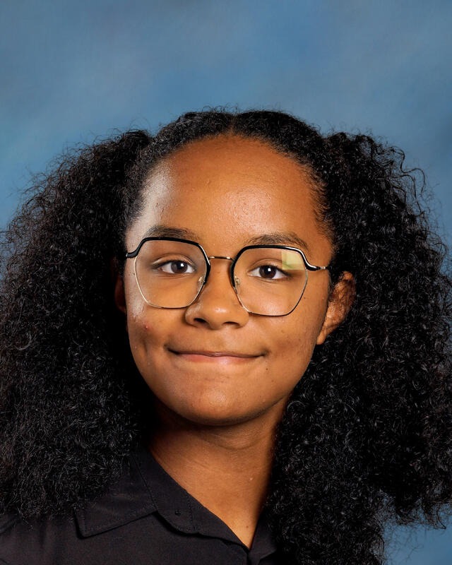 a student smiling