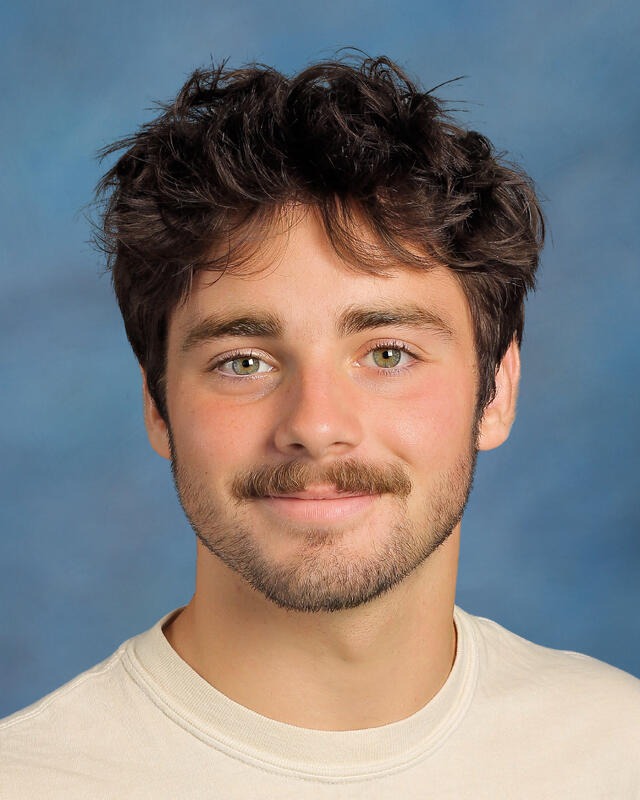 a student smiling