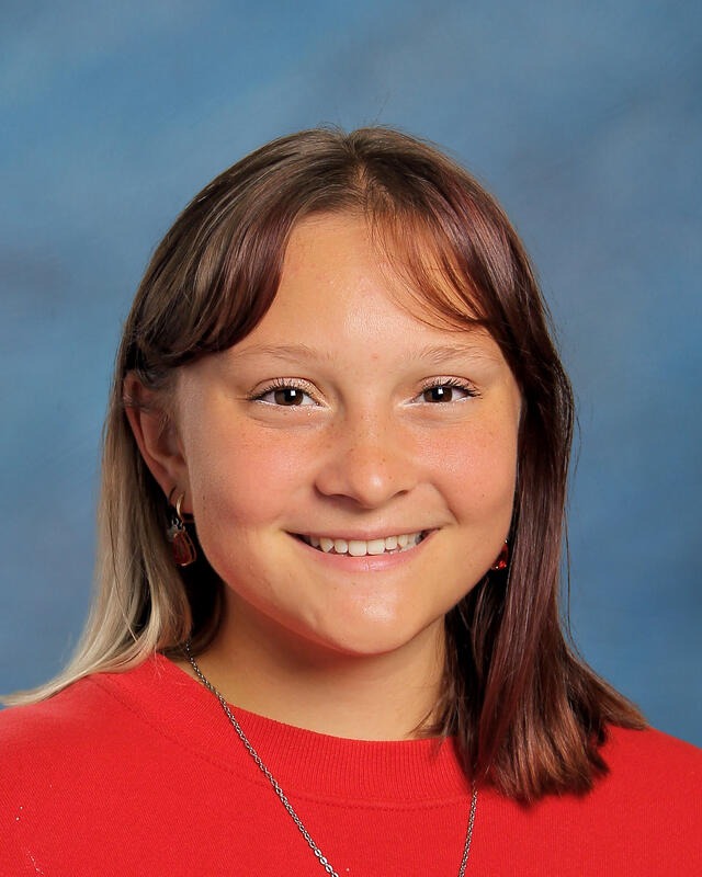 a student smiling