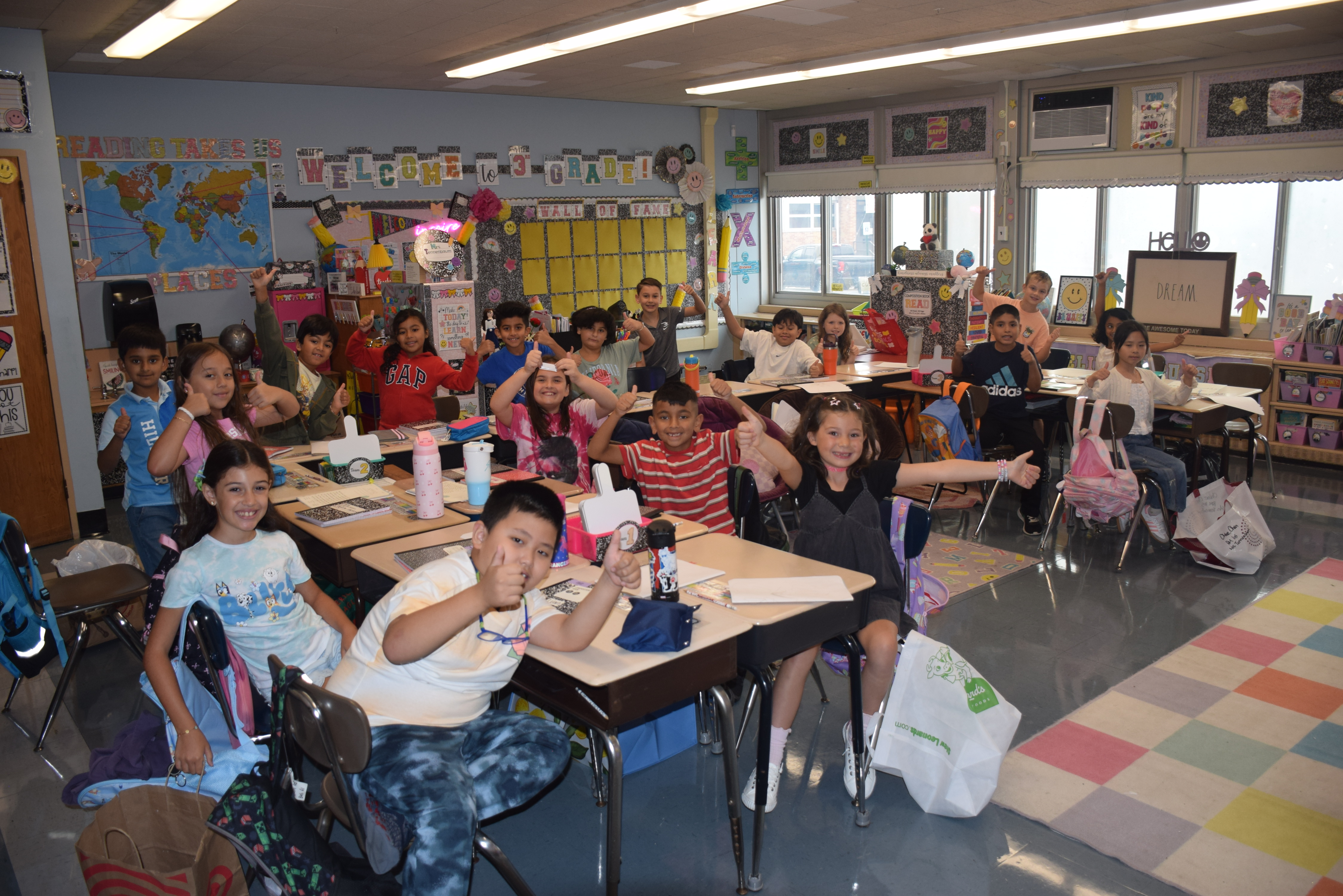 Photo of students smiling.