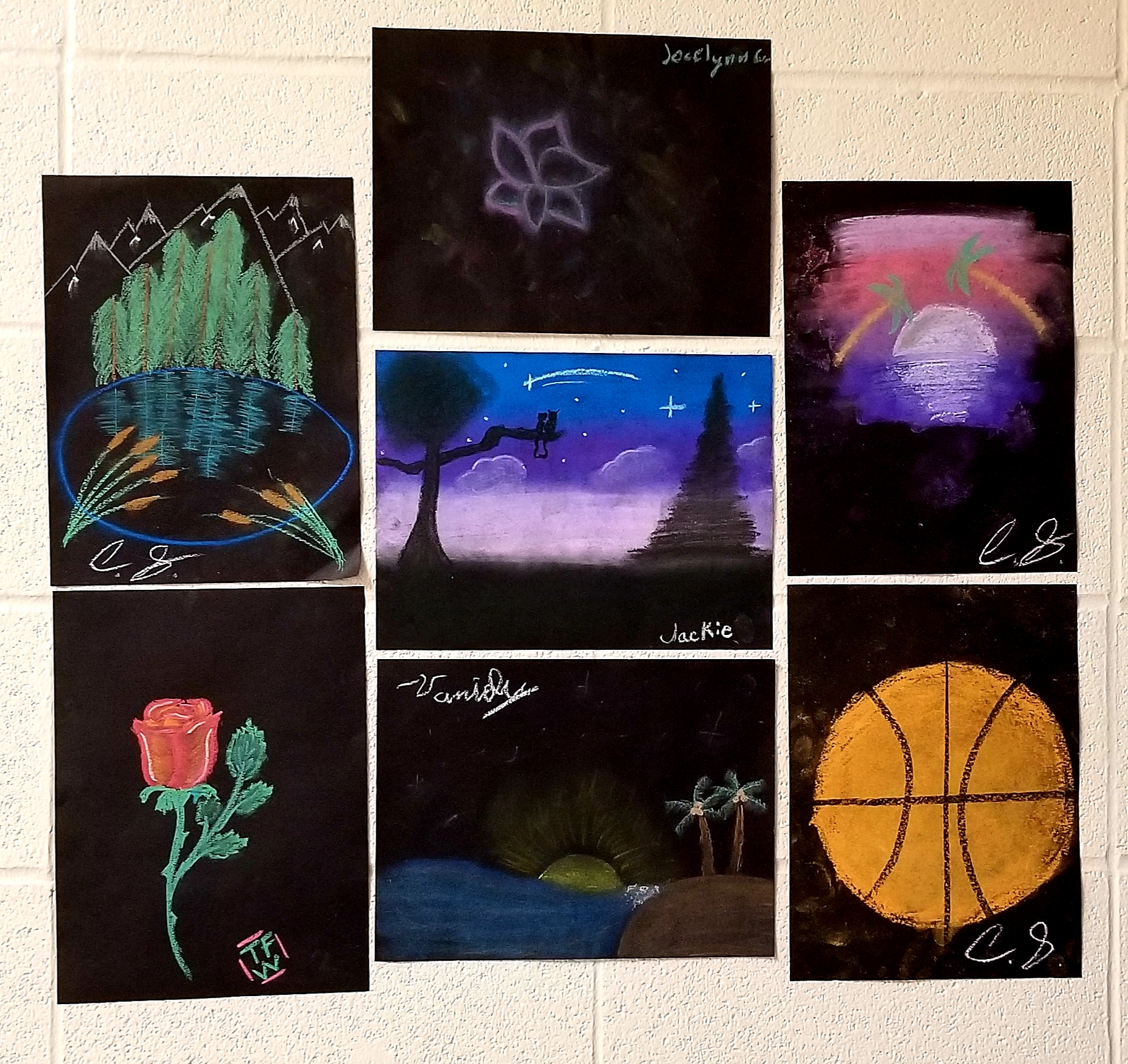 Middle school students art projects in the hallway.