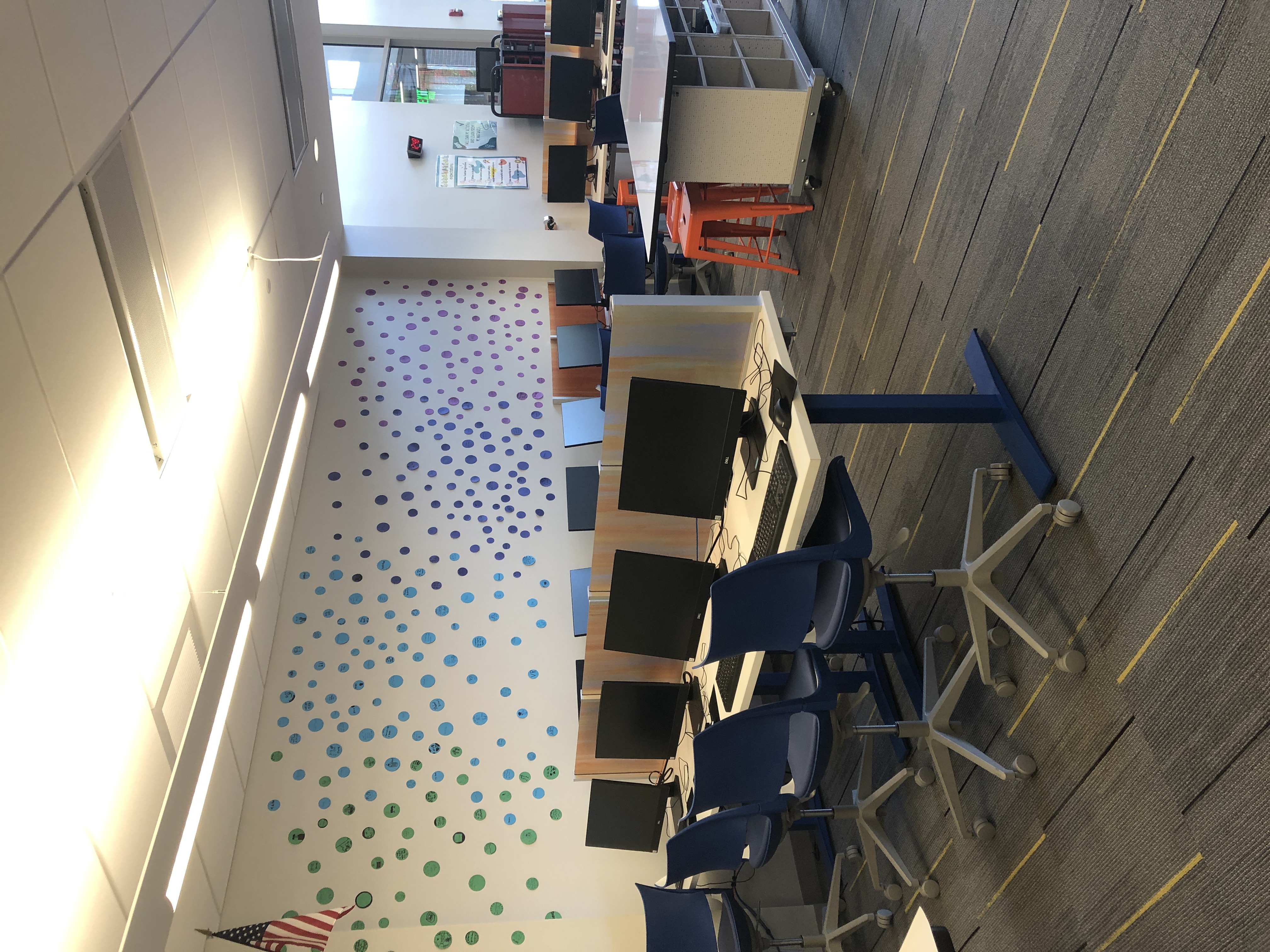 Computer Lab with colorful dots to decorate the wall