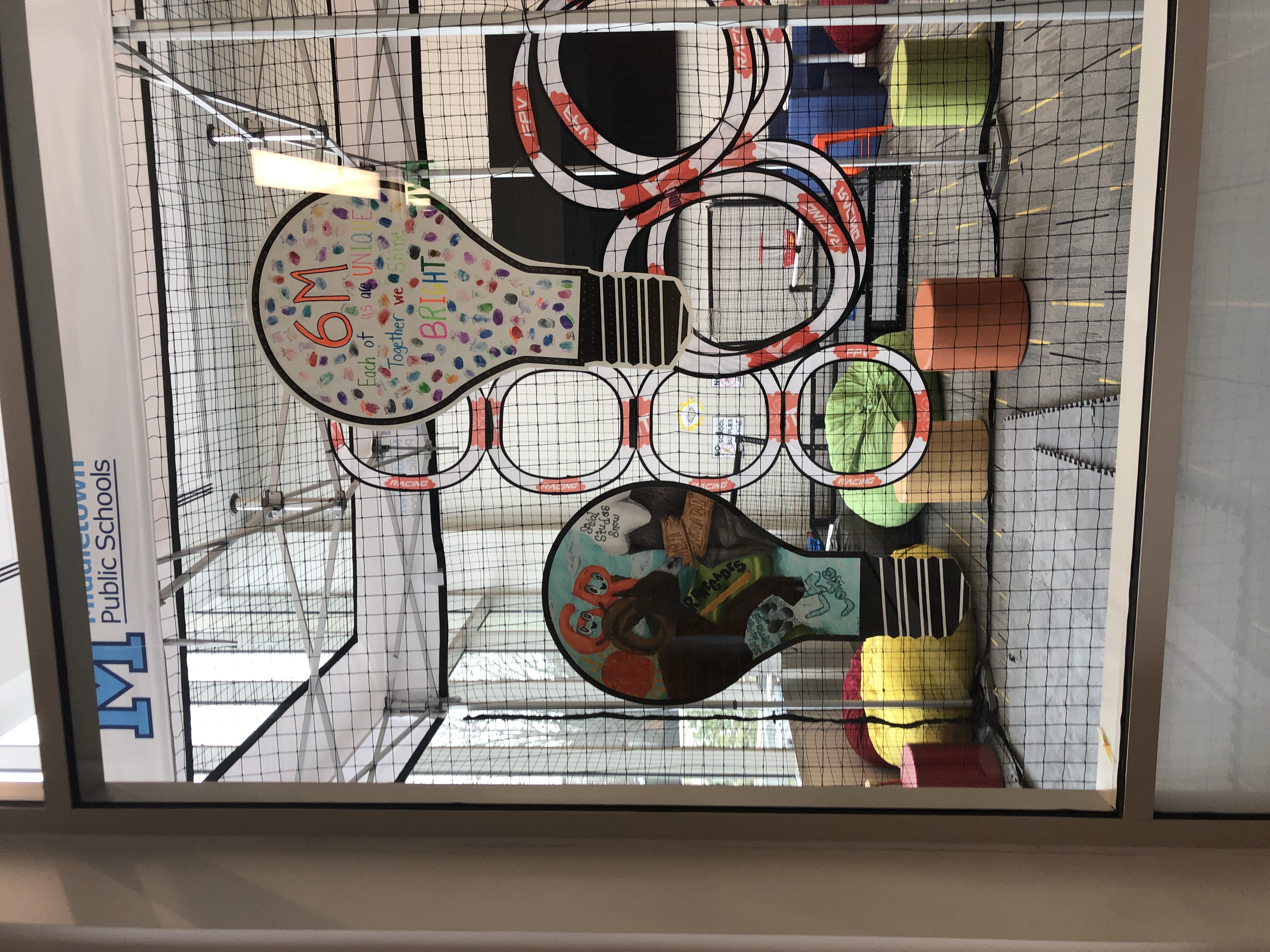 view of the Innovation Center from the hallway, looking at light bulbs decorated by studentsview of the Innovation Center from the hallway, looking at light bulbs decorated by students